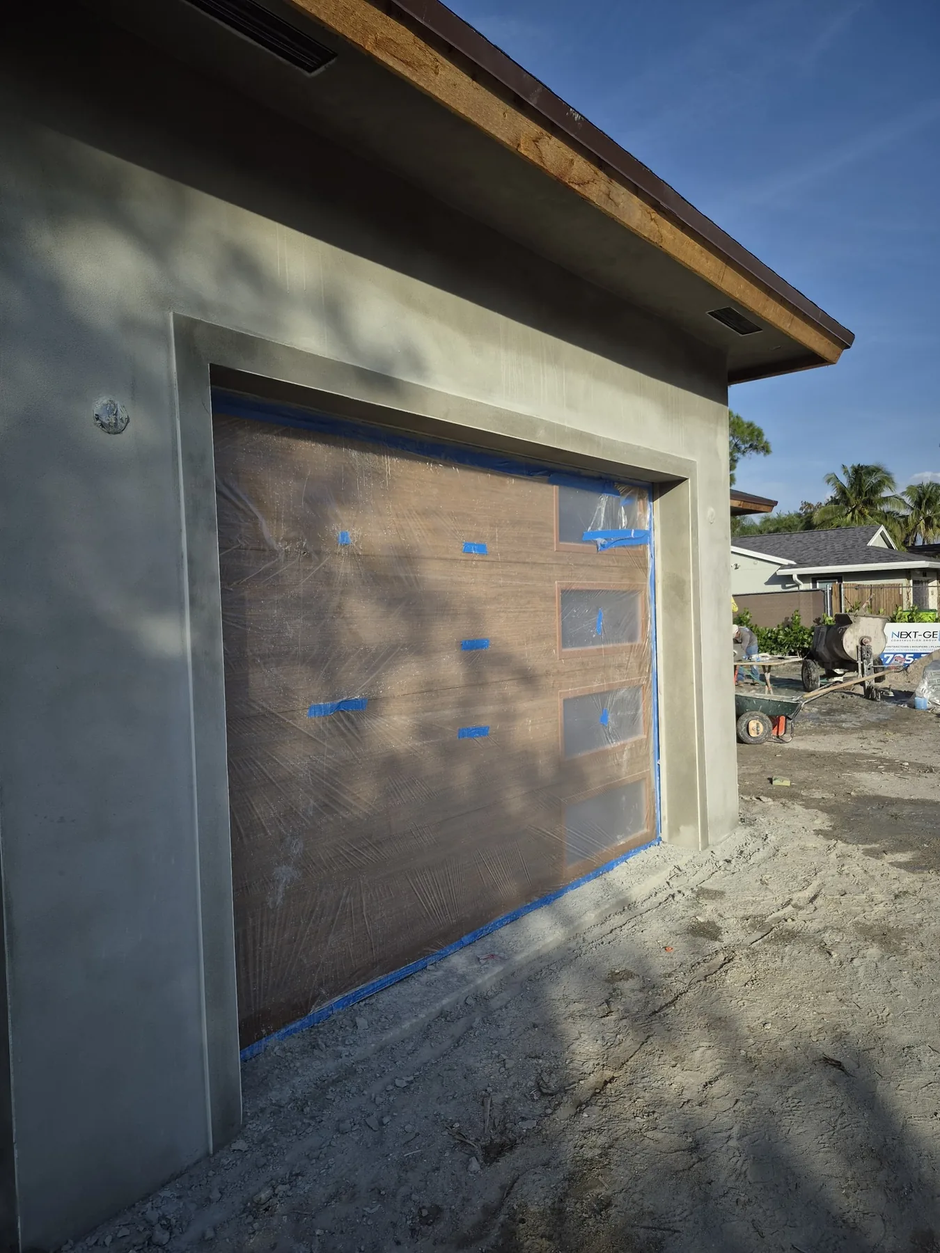Garage exterior stucco repair and finish work