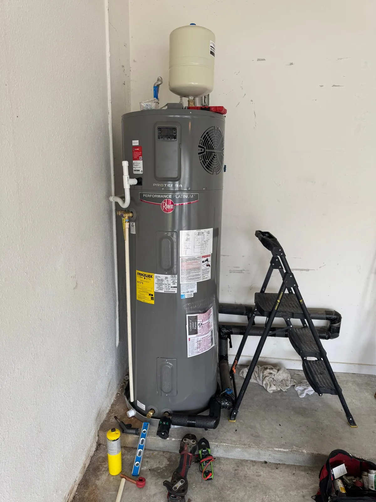 Water heater installation and plumbing support
