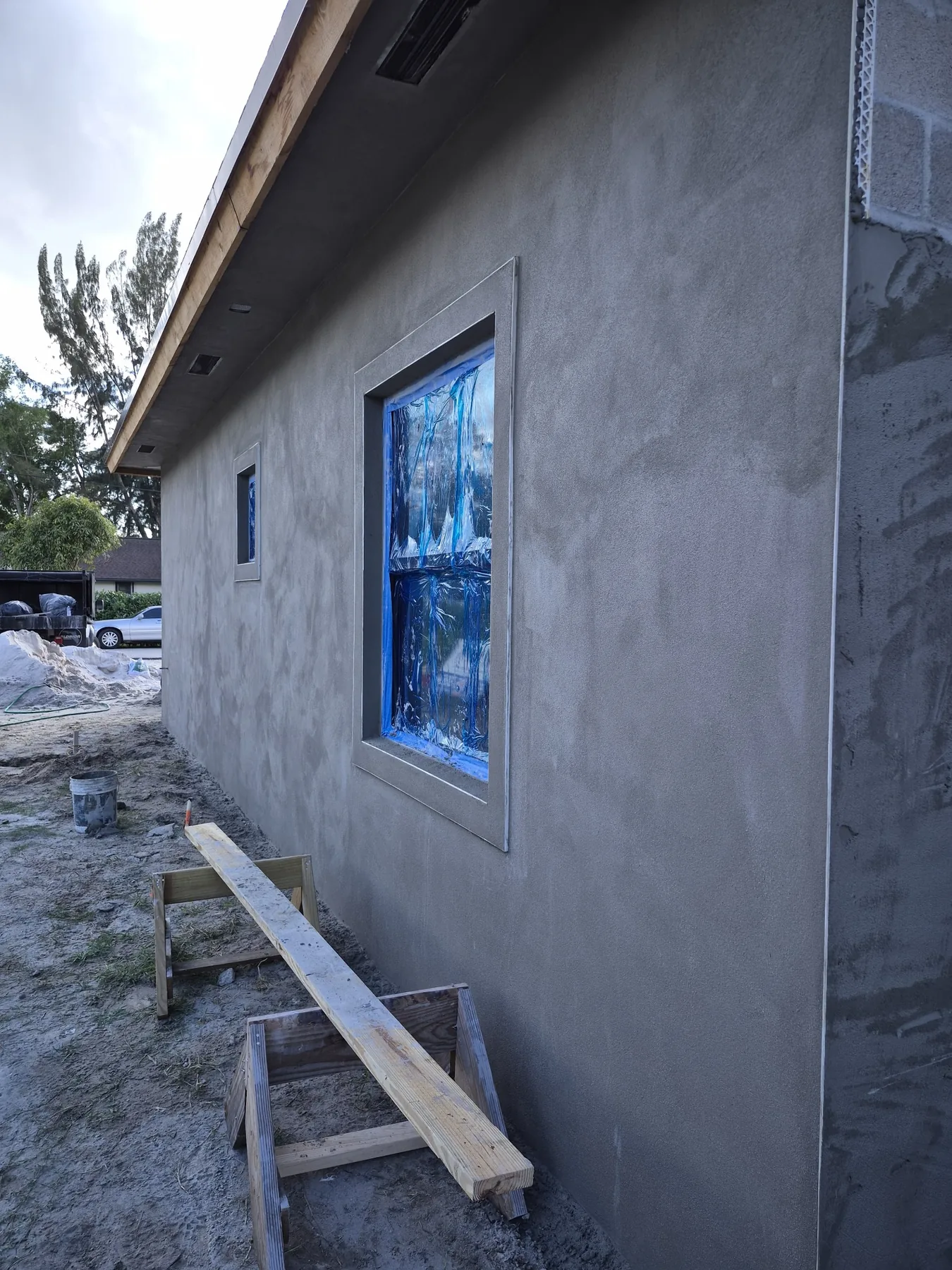 Exterior wall and window stucco finishing
